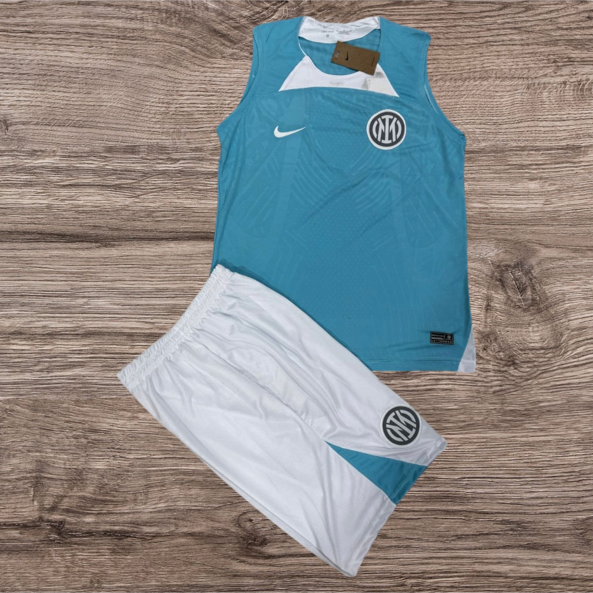 Conjunto regata e shorts Nike azul e branco – Atacado no Brás
