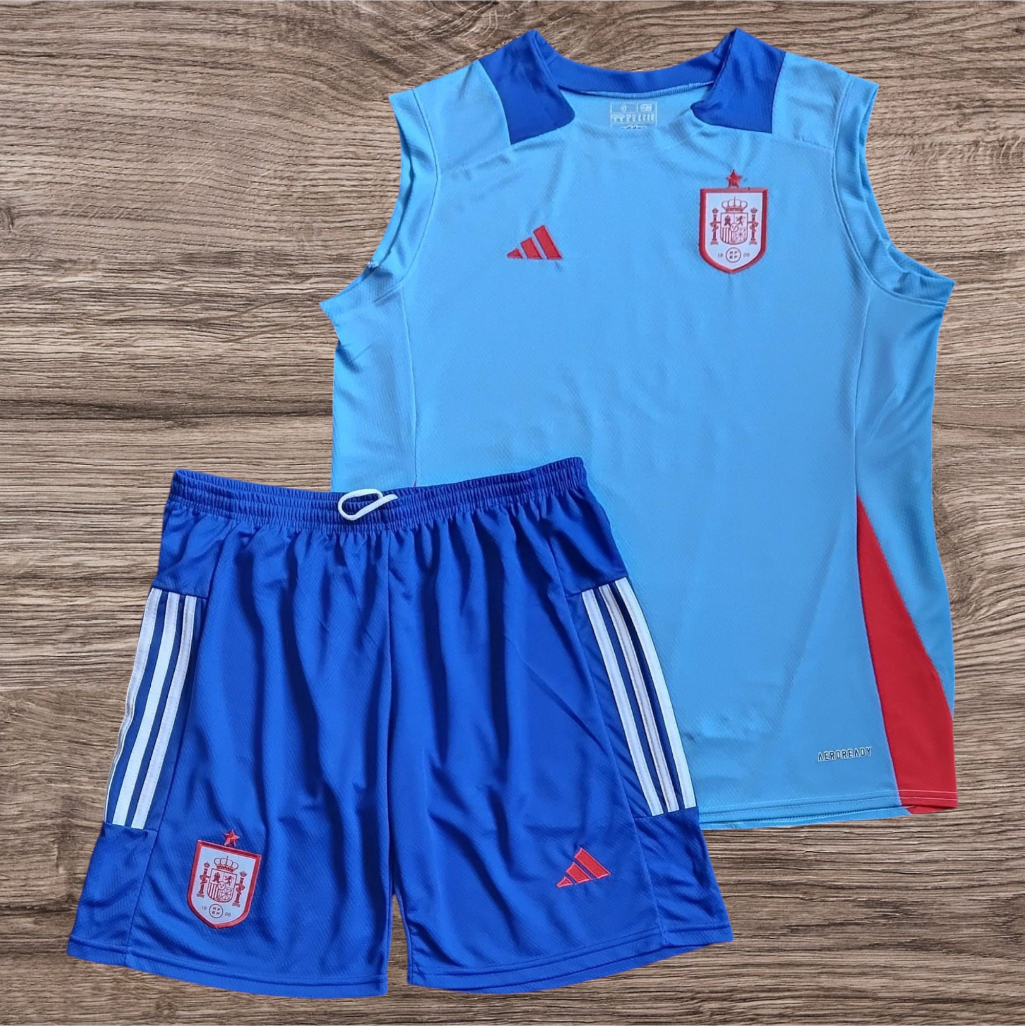 Conjunto Espanha regata e shorts azul – Atacado no Brás